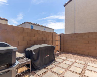 8216 W Albeniz Place - Photo Thumbnail 22