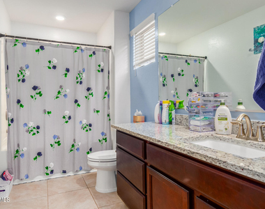 8216 W Albeniz Place - Photo Thumbnail 14