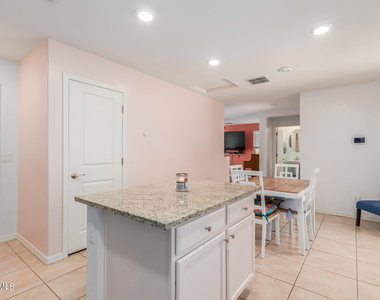 8216 W Albeniz Place - Photo Thumbnail 9