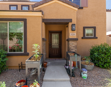 8216 W Albeniz Place - Photo Thumbnail 1