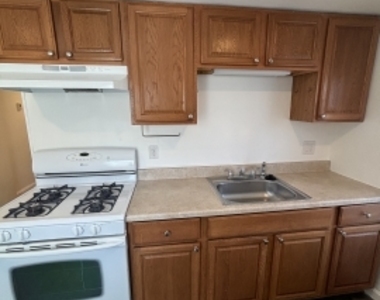 75 Pleasant St - Photo Thumbnail 2