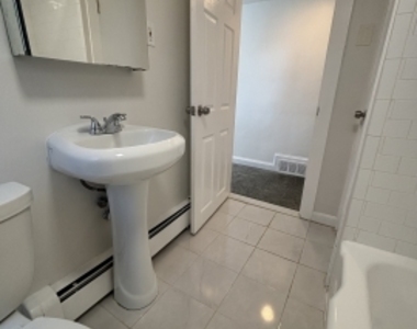 75 Pleasant St - Photo Thumbnail 6