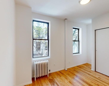 East 65 Street - Photo Thumbnail 2