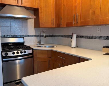 111-31 66th Avenue - Photo Thumbnail 3