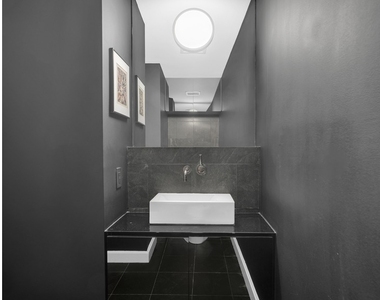 100 W 58th Street - Photo Thumbnail 5