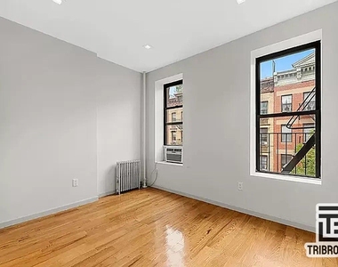 406 W 48th Street - Photo Thumbnail 3