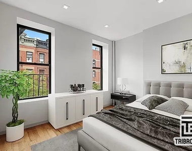 406 W 48th Street - Photo Thumbnail 1