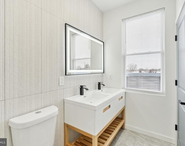 5937 Osage Avenue - Photo Thumbnail 1