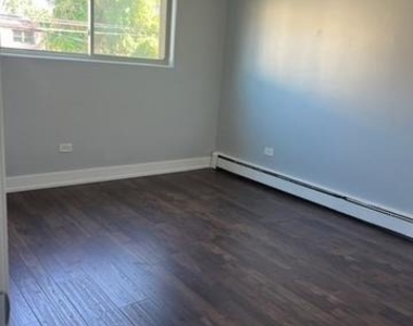 8141 S Ingleside Avenue - Photo Thumbnail 1