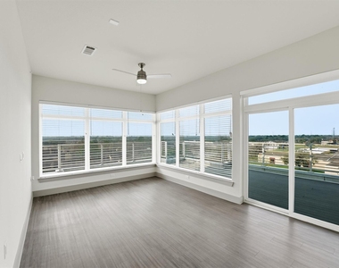 6955 Turtlewood Drive - Photo Thumbnail 2