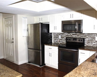 14555 Wunderlich Drive - Photo Thumbnail 1