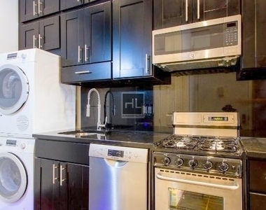 W 14th St. - Photo Thumbnail 3