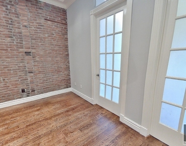 W 14th St. - Photo Thumbnail 4