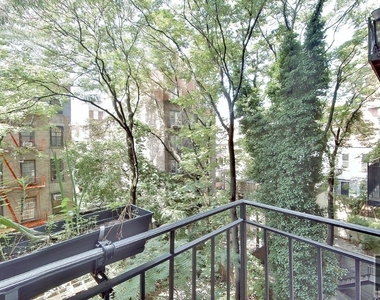 W 14th St. - Photo Thumbnail 8