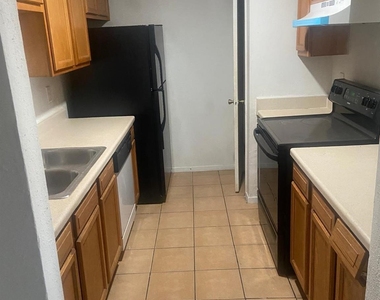 10555 Turtlewood Court - Photo Thumbnail 2