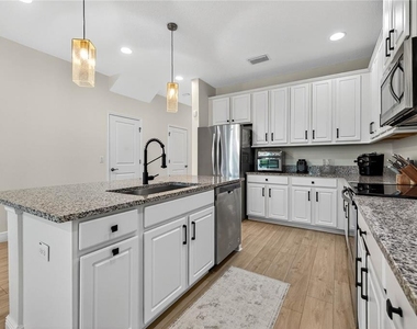 8128 Muddy Pines Place - Photo Thumbnail 10