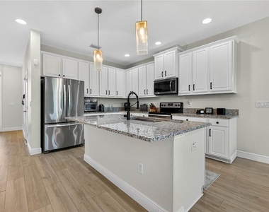 8128 Muddy Pines Place - Photo Thumbnail 8