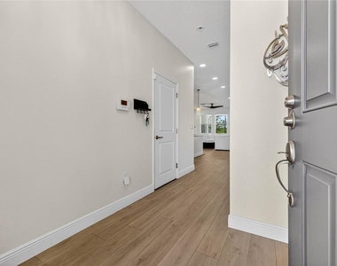 8128 Muddy Pines Place - Photo Thumbnail 3