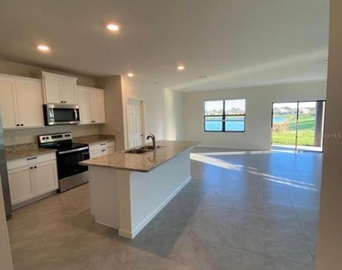 822 Se Remington Green Drive - Photo Thumbnail 14