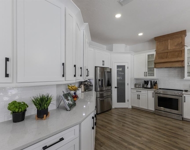 9405 Boxthorn Place - Photo Thumbnail 39
