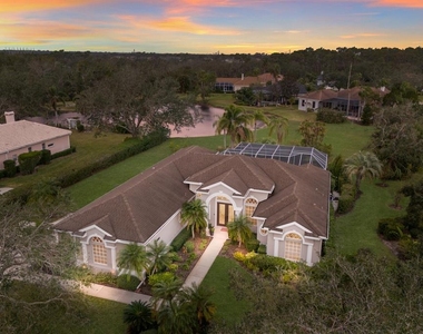 9405 Boxthorn Place - Photo Thumbnail 1