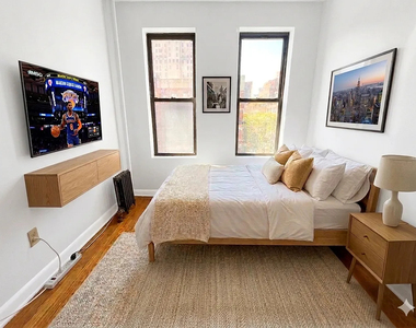 W. 51st Street - Photo Thumbnail 1