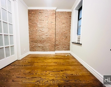 E 23rd St. - Photo Thumbnail 1