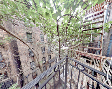 W 52nd St. - Photo Thumbnail 3
