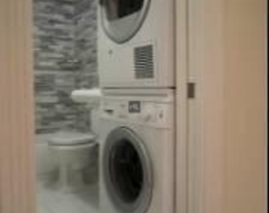 W 52nd St. - Photo Thumbnail 3