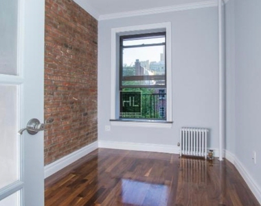 W 21st St. - Photo Thumbnail 3