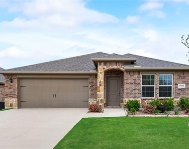 1302 Meadow Creek Drive - Photo Thumbnail 1
