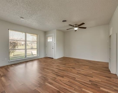 7704 Woodspan Drive - Photo Thumbnail 1