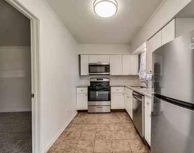 7704 Woodspan Drive - Photo Thumbnail 6