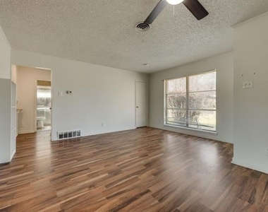 7704 Woodspan Drive - Photo Thumbnail 3