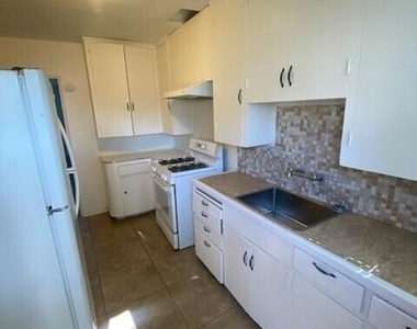 1507 N 15th Avenue - Photo Thumbnail 3
