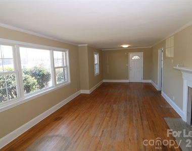3741 N Sharon Amity Road - Photo Thumbnail 2