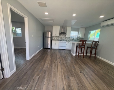 145 W 118th Place - Photo Thumbnail 2