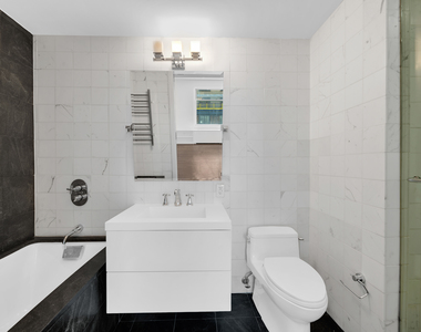 100 W 58th St - Photo Thumbnail 7