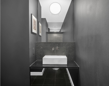100 W 58th St - Photo Thumbnail 5