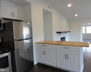 7029 Woodley Lane - Photo Thumbnail 4