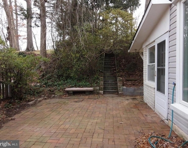 7029 Woodley Lane - Photo Thumbnail 2