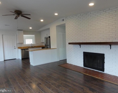 7029 Woodley Lane - Photo Thumbnail 7