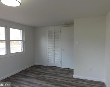 7029 Woodley Lane - Photo Thumbnail 14
