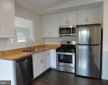 7029 Woodley Lane - Photo Thumbnail 6
