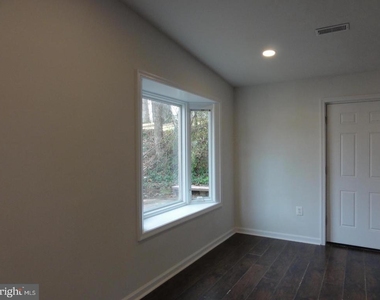 7029 Woodley Lane - Photo Thumbnail 18