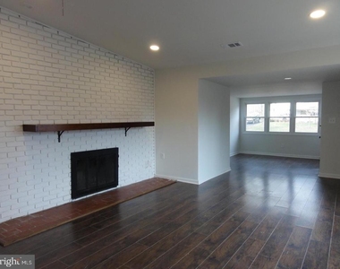 7029 Woodley Lane - Photo Thumbnail 8