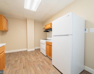 414-416 W Park Avenue - Photo Thumbnail 3