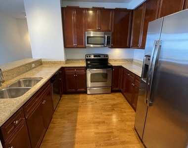 100 E 14th Street - Photo Thumbnail 1