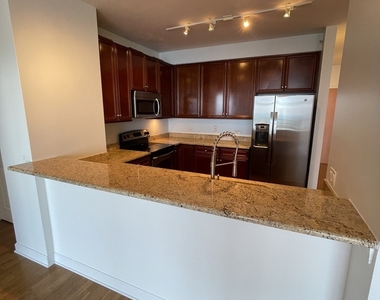 100 E 14th Street - Photo Thumbnail 2
