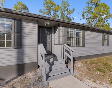 1505 E 15th Street - Photo Thumbnail 3